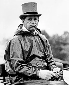 Prince Philip shows what he thinks of the weather. 17th May 1978 Prince Philip shows what he thinks of the weather. 17th May 1978