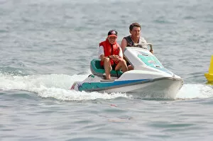 Images Dated 25th July 1994: Prince William on a jet ski while on holiday in Marbella, Spain, July 1994