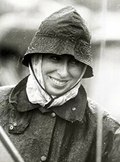 Princess Anne looking wet in Rain Gatcombe Park Smiling in wet-weather gear