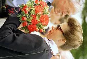 Images Dated 11th July 1996: Princess Anne opens Rachael House Childrens Hospice holding bunch of Wee Cracker roses