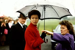 Images Dated 17th April 1996: Princess Anne visit to Denny umbrella red coat