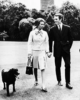 Images Dated 30th May 1973: Princess Anne walking with her fiance Mark Phillips after the announcement of