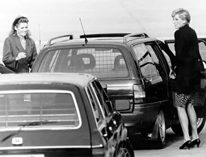 Images Dated 22nd August 1990: Princess Diana at Aberdeen airport with the Duchess of York Sarah Ferguson en route to