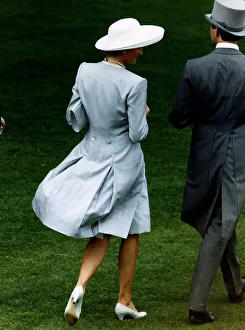 Princess Diana attends the Ascot races. She is wearing a pearl grey silk top coat Princess Diana attends the Ascot races. She is wearing a pearl grey silk top coat
