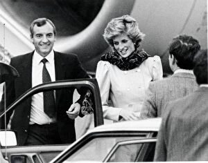 Princess Diana with her bodyguard at Aberdeen Airport as she interrupts her holiday in