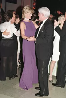 Images Dated 5th June 1996: Princess Diana dances with American chat show host Phil Donahue at a charity gala dinner