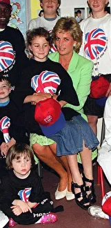 Princess Diana with Danielle Stephenson sitting on her knee during a visit to Princess Diana with Danielle Stephenson sitting on her knee during a visit to