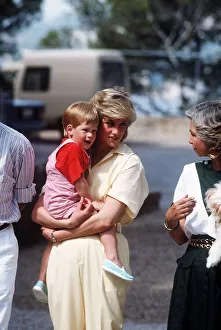 Princess Diana holds her young son Prince Harry on holiday in Majorca, Spain Princess Diana holds her young son Prince Harry on holiday in Majorca, Spain