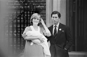 Princess Diana, the Princess of Wales holds her newborn baby son William with husband Princess Diana, the Princess of Wales holds her newborn baby son William with husband