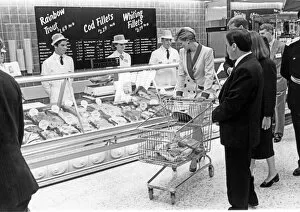 Images Dated 11th September 1990: Princess Diana, The Princess of Wales, takes a shopping trolley around Tesco at Southport