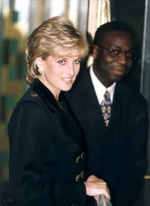 Princess Diana Gallery: PRINCESS DIANA WEARING A BLACK SUIT ARRIVES AT THE SAVOY THEATRE FOR THE AGM OF THE