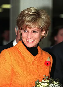 Princess Diana Gallery: Princess Diana, wearing orange jacket, poppy and black jumper visits Liverpool'