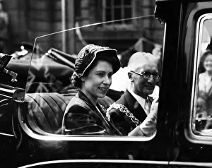 Princess Elizabeth smiles at the crowds along the route during her visit to the West Princess Elizabeth smiles at the crowds along the route during her visit to the West