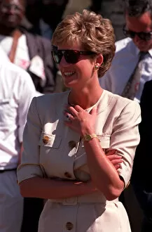 Images Dated 16th July 1993: PRINCESS OF WALES WEARING SUNGLASSES AND SMILING DURING A VISIT TO RED CROSS CHARITY