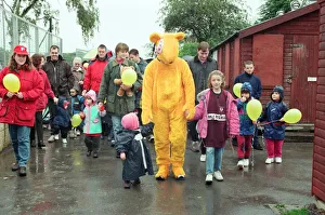 Pudsey Bear leads the toddlers round the park during the Great Toddle for Children in Pudsey Bear leads the toddlers round the park during the Great Toddle for Children in