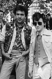 Images Dated 30th July 1977: Punk Rocker and Teddy Boy youths in Kings Road, London. Pictured, two teddy boys