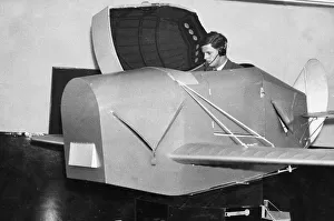 A pupil emerging from the Link trainer used for initial instruction at an RAF training A pupil emerging from the Link trainer used for initial instruction at an RAF training