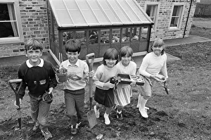 Pupils of Scholes Junior and Infant School ready to plant seedlings grown in the new Pupils of Scholes Junior and Infant School ready to plant seedlings grown in the new