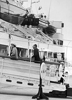 The Queen and The Duke of Edinburgh seen here returning to the Royal Yacht Britannia at