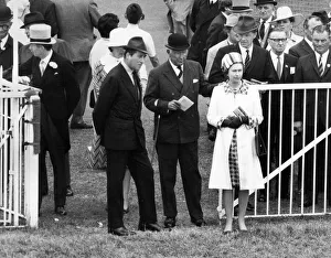 Queen Elizabeth II accompanied by the Duke of Norfolk watching the parade of Oaks runners Queen Elizabeth II accompanied by the Duke of Norfolk watching the parade of Oaks runners