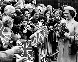 Queen Elizabeth II is all smiles as she meets the people of Warrington, Cheshire Queen Elizabeth II is all smiles as she meets the people of Warrington, Cheshire
