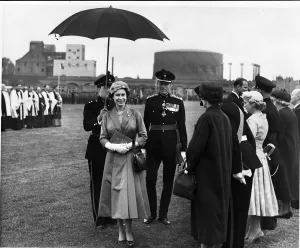 Queen Elizabeth II attends the ceremony on the Roodee, Chester, under heavy skies Queen Elizabeth II attends the ceremony on the Roodee, Chester, under heavy skies