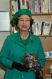 Queen Elizabeth II August 1986 on a visit to Clydebank wearing a green suit black dots