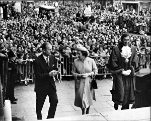 Queen Elizabeth II and The Duke of Edinburgh with the huge crowd behind them in Queen Elizabeth II and The Duke of Edinburgh with the huge crowd behind them in