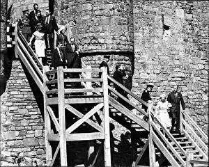 Queen Elizabeth II and The Duke of Edinburgh lead the party down the wooden steps as Queen Elizabeth II and The Duke of Edinburgh lead the party down the wooden steps as