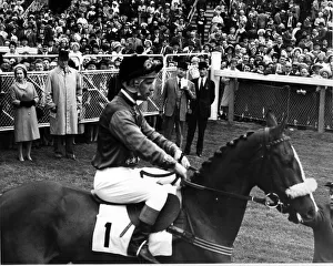 Queen Elizabeth II, with Lord Sefton, watches her horse Garter Lady go out for Queen Elizabeth II, with Lord Sefton, watches her horse Garter Lady go out for