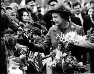 Queen Elizabeth II meets the happy crowd on her walkabout after opening the Delyn Borough Queen Elizabeth II meets the happy crowd on her walkabout after opening the Delyn Borough