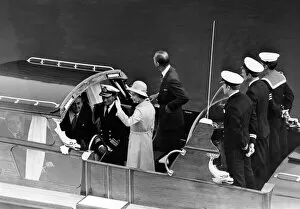 Images Dated 23rd June 1977: Queen Elizabeth II and Prince Philip pictured leaving Barry docks on the Royal barge