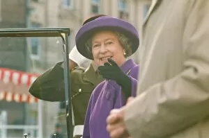 Images Dated 28th November 1991: Queen Elizabeth II and Prince Philip visit Durham - The Queen points at something amusing