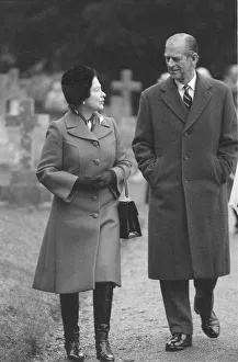 Queen Elizabeth II and Prince Philip walking through Sandringham. February 1986 Queen Elizabeth II and Prince Philip walking through Sandringham. February 1986