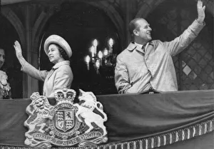 Queen Elizabeth II and Prince Philip wave to the crowds from a balcony at Durham Town Queen Elizabeth II and Prince Philip wave to the crowds from a balcony at Durham Town