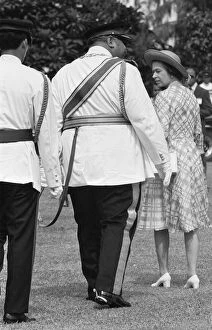 Queen Elizabeth II seen here in Tonga with the King Taufa'