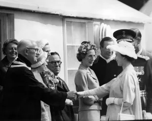 Queen Elizabeth II visiting Wales. The Queen shakes hands with Mr T W Thomas Queen Elizabeth II visiting Wales. The Queen shakes hands with Mr T W Thomas