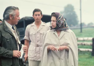 Queen Elizabeth II (with Prince Charles behind), attends the 1976 Olympic Games in Canada Queen Elizabeth II (with Prince Charles behind), attends the 1976 Olympic Games in Canada