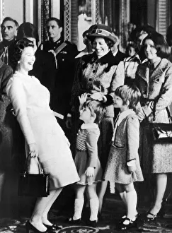 The Queen laughs at a joke made by a daughter of DI James Beaton The Queen laughs at a joke made by a daughter of DI James Beaton