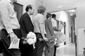 Images Dated 21st June 1970: Queueing up outside ward 4 at the Mile End Hospital, London the men wait to visit their