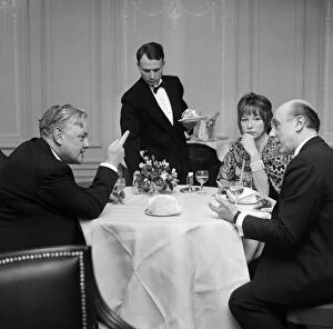 Quintin Hogg MP in conversation with film star Shirley MacLaine at the Savoy Hotel