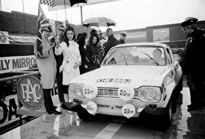 Motorsport Gallery: RAC Rally November 1970 Miss Great Britain Kathleen Winstanley waves off a Ford