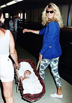 Rachel wife of rock star Rod Stewart and their eight week old baby Renee July 1992