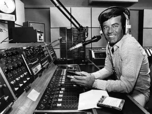 Radio One disc jockey Tony Blackburn behind the record decks spinning the discs for Radio One disc jockey Tony Blackburn behind the record decks spinning the discs for