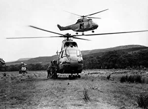 Three RAF Westland Puma helicopters refuel during Operation Sky Warrier at Otterburn