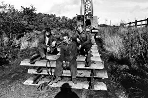 Railway enthusiasts Derek Cowan, Eric Maxwell and Neil Morgan taking a break from track