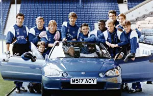 Images Dated 4th August 1994: The Rangers first team try out a Honda for size at the launch of the £