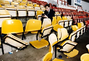 Images Dated 22nd March 1992: Rangers sales marketing executive Brain Main surveys the damage at the Broomloan Road