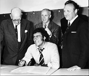 Ray Kennedy signs for Liverpool Football Club with manager Bill Shankly