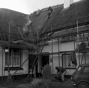Re-thatching of the Manor Inn at Preston in November 1970 Re-thatching of the Manor Inn at Preston in November 1970